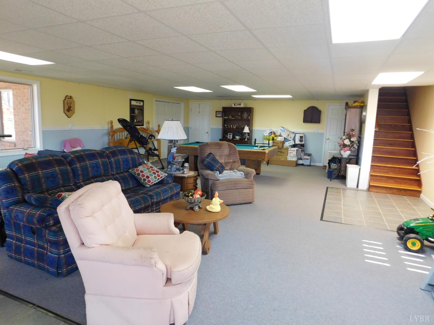320 Ruth Drive Madison Heights, VA 24572 - Photo 53 of 60 a living room with furniture and wooden floor