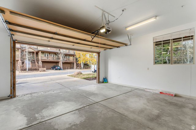 3026 Lower Saddleback Road Park City, UT 84098 - Photo 61 of 71 Garage featuring a garage door opener