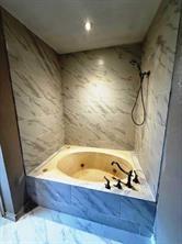 426 Gun Club Road Denison, TX 75021 - Photo 14 of 20 Bathroom featuring a jetted tub