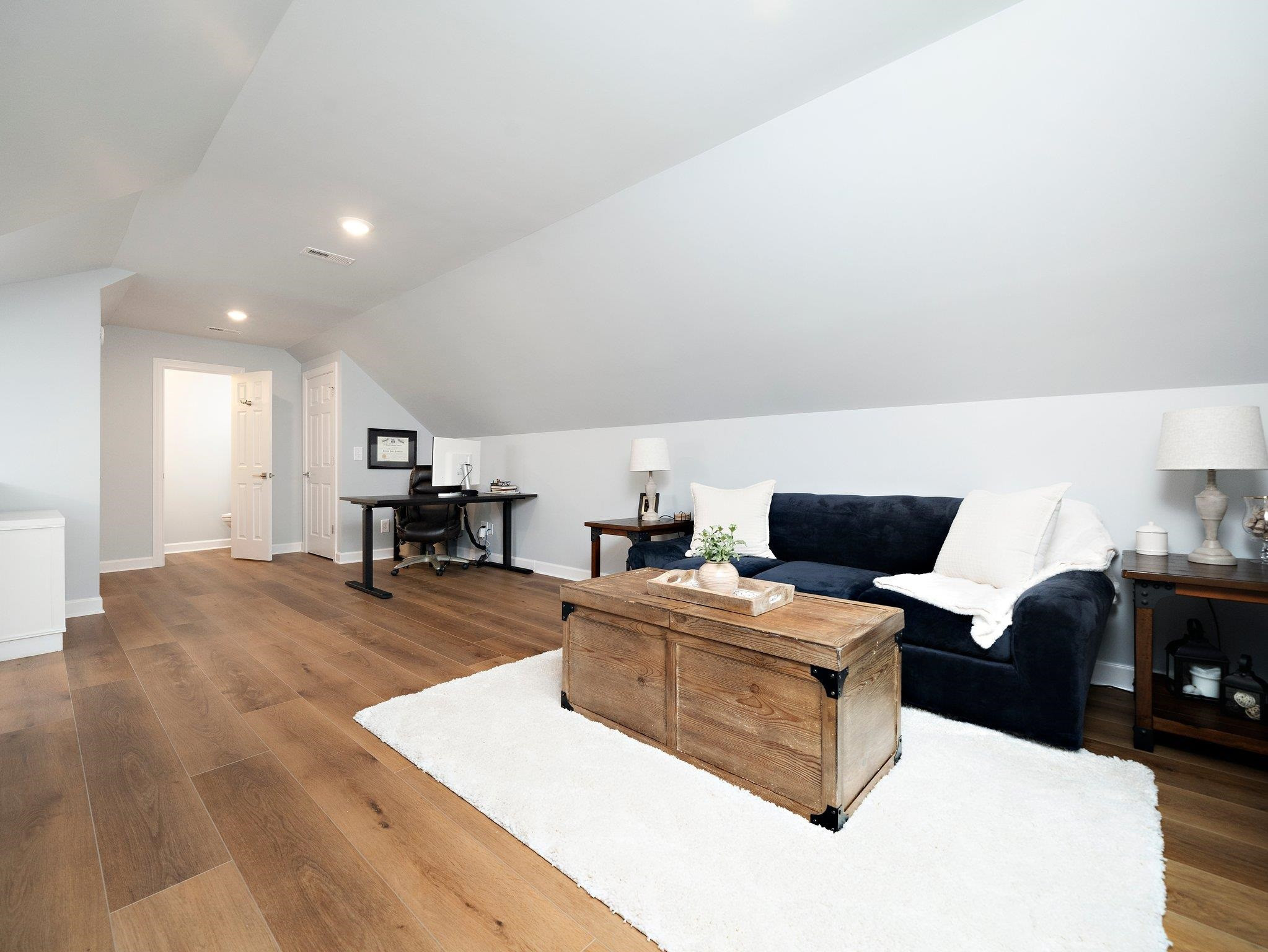 1304 Patterson Grove Road Apex, NC 27502 - Photo 26 of 34 Spacious Multi-use Room with Engineered Hardwood Flooring