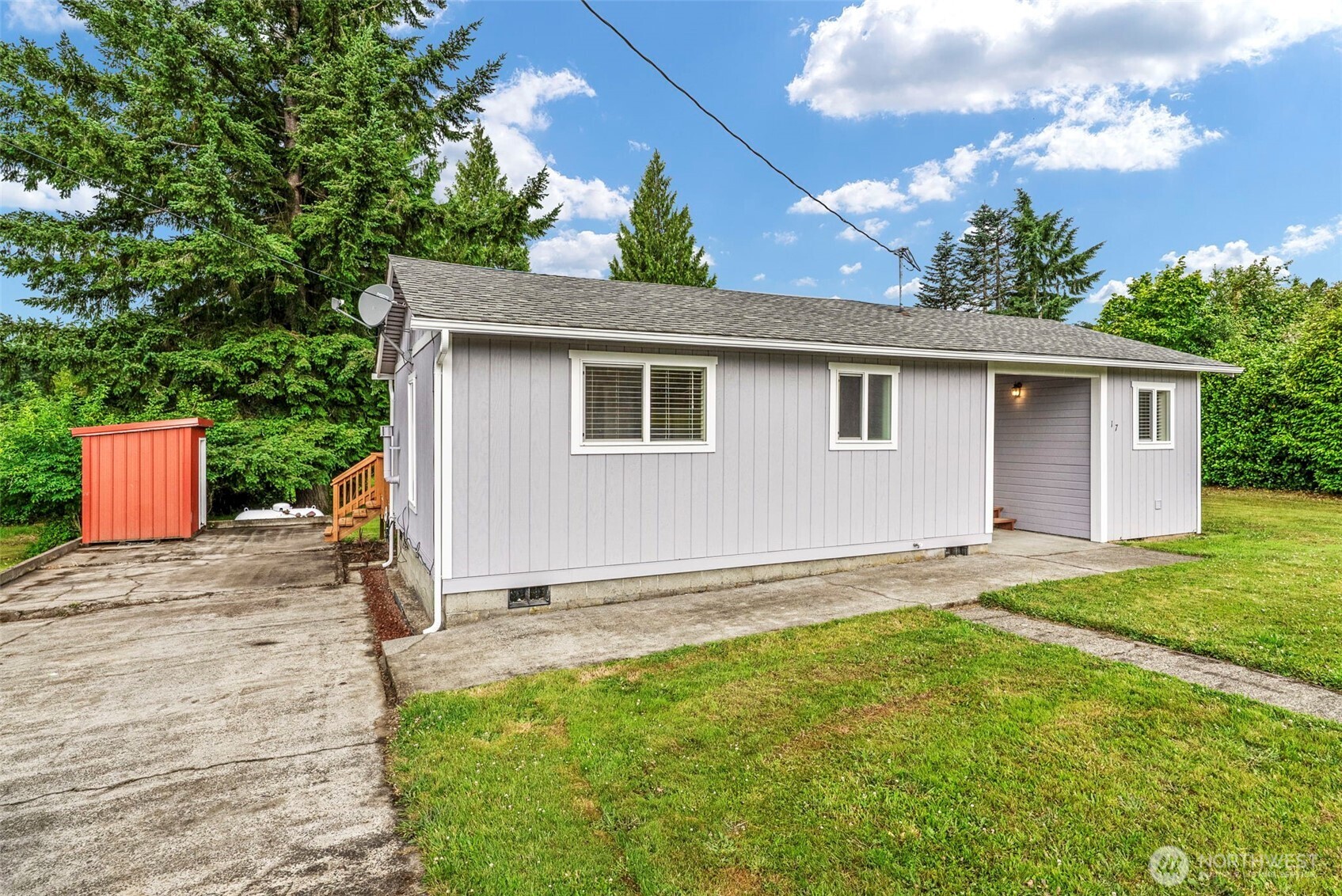 175 Jacobson Road Cathlamet, WA 98612 - Photo 1 of 32 a backyard of a house with lots of green space