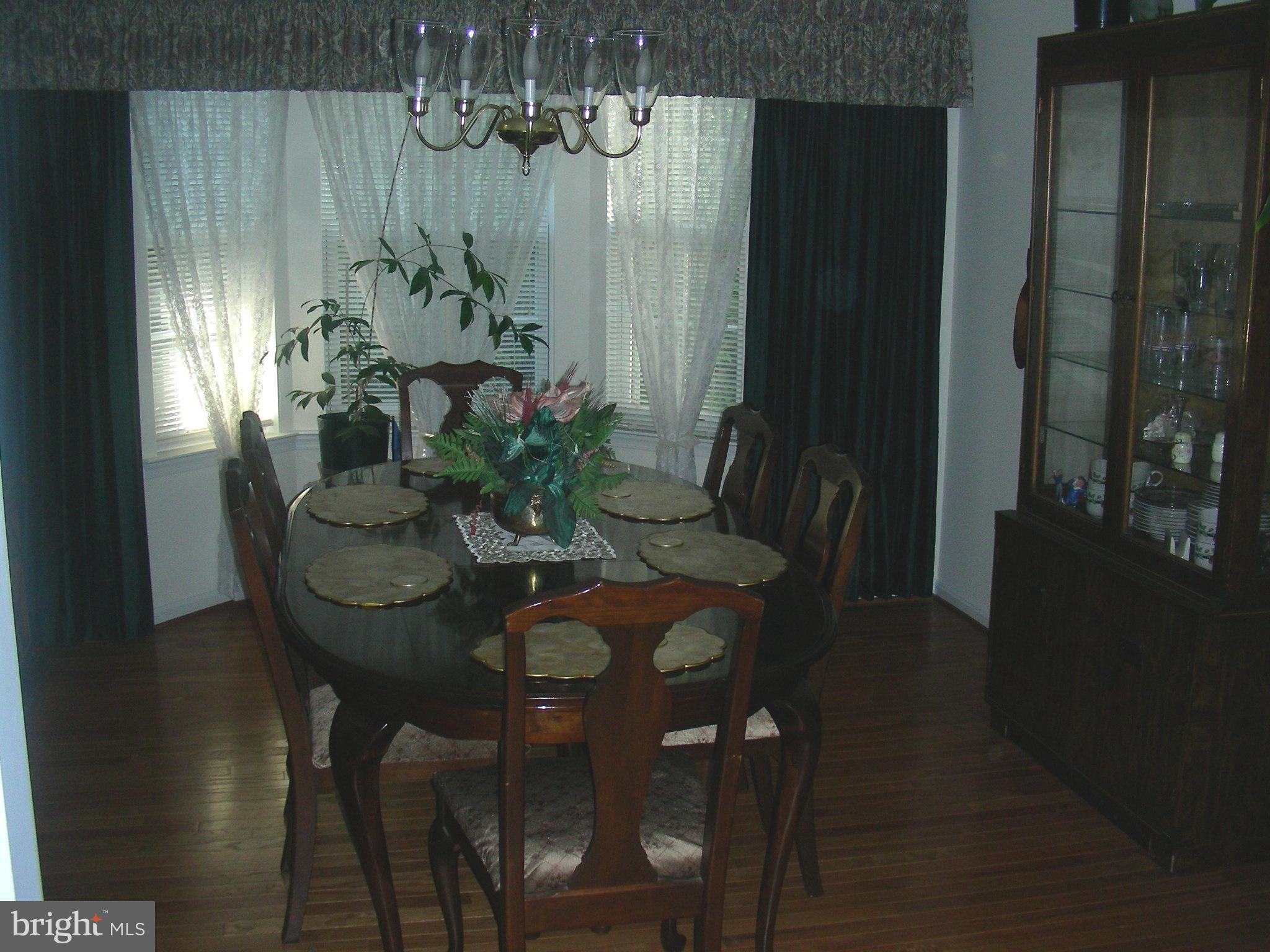 9422 Sandy Creek Road Fort Washington, MD 20744 - Photo 10 of 25 Hardwood floor dining room