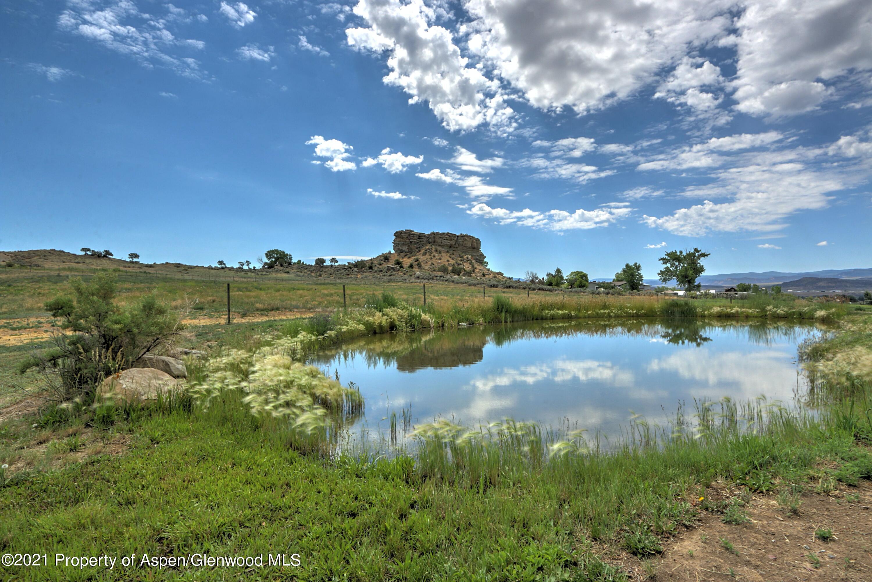 135 Swiss Lane Rifle, CO 81650 - Photo 34 of 46 a view of lake with green space