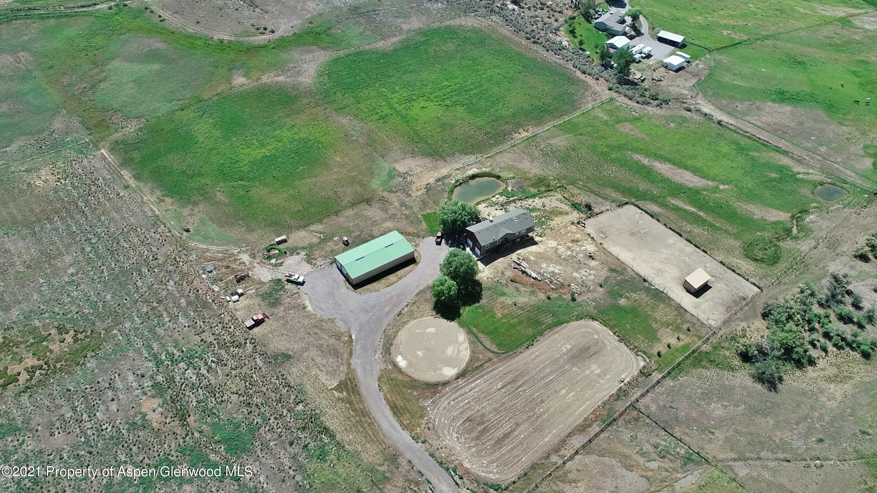 135 Swiss Lane Rifle, CO 81650 - Photo 36 of 46 an aerial view of multiple house with yard