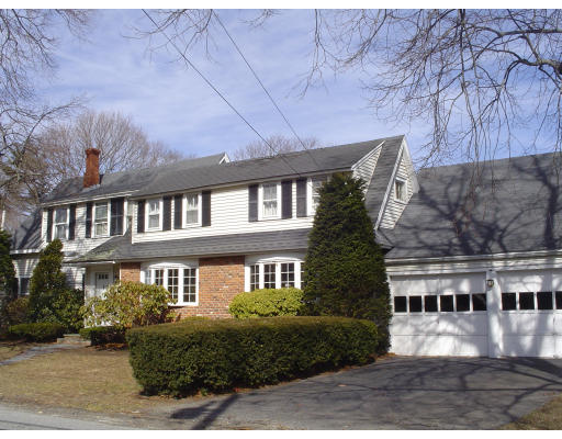 596 Hatherly Road Scituate, MA 02066 - Photo 1 of 8 a front view of a residential apartment building with a yard