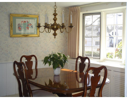 596 Hatherly Road Scituate, MA 02066 - Photo 4 of 8 a view of a dining room with furniture window and outside view