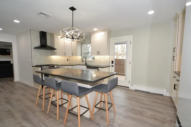 $765,000 | 34 Stewart Circle North, Centereach, NY 11720