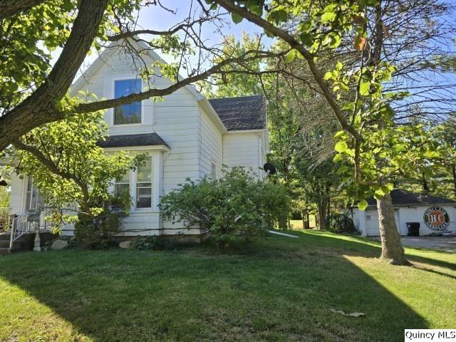 228 Wabash Avenue Carthage, IL 62321 - Photo 25 of 35 a view of house with a yard