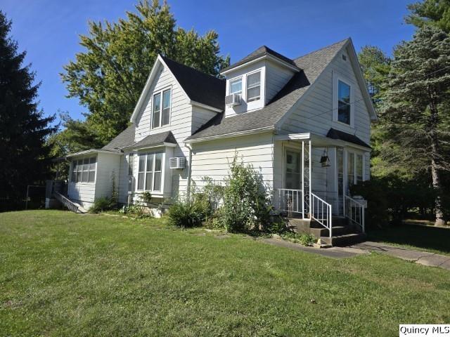 228 Wabash Avenue Carthage, IL 62321 - Photo 28 of 35 a view of a house with a yard and large trees
