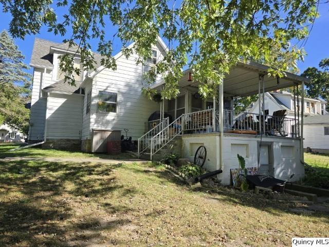 228 Wabash Avenue Carthage, IL 62321 - Photo 32 of 35 a view of a house with a yard