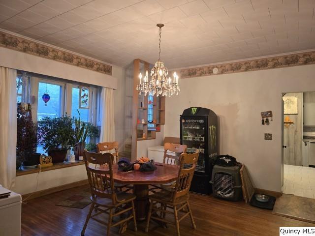 228 Wabash Avenue Carthage, IL 62321 - Photo 8 of 35 a view of a dining room with furniture and wooden floor