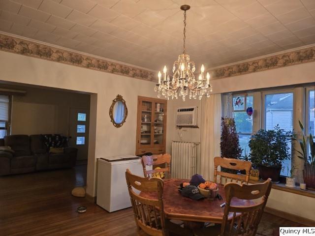 228 Wabash Avenue Carthage, IL 62321 - Photo 9 of 35 a view of a dining room with furniture wooden floor and chandelier