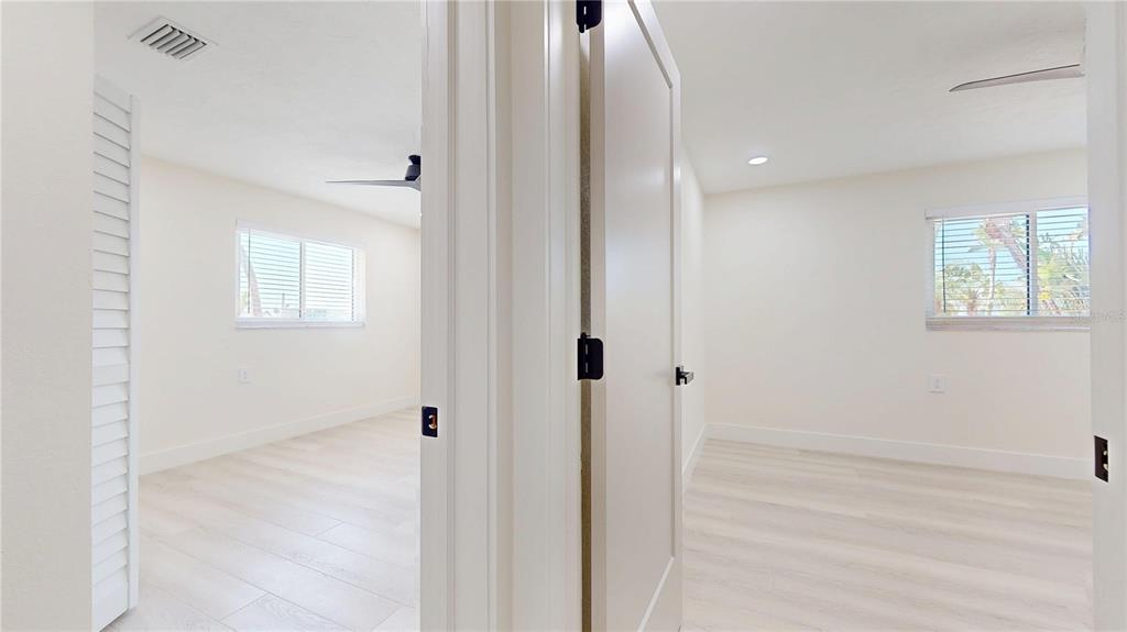 6380 3rd Palm Point St. Pete Beach, FL 33706 - Photo 25 of 48 a view of an empty room