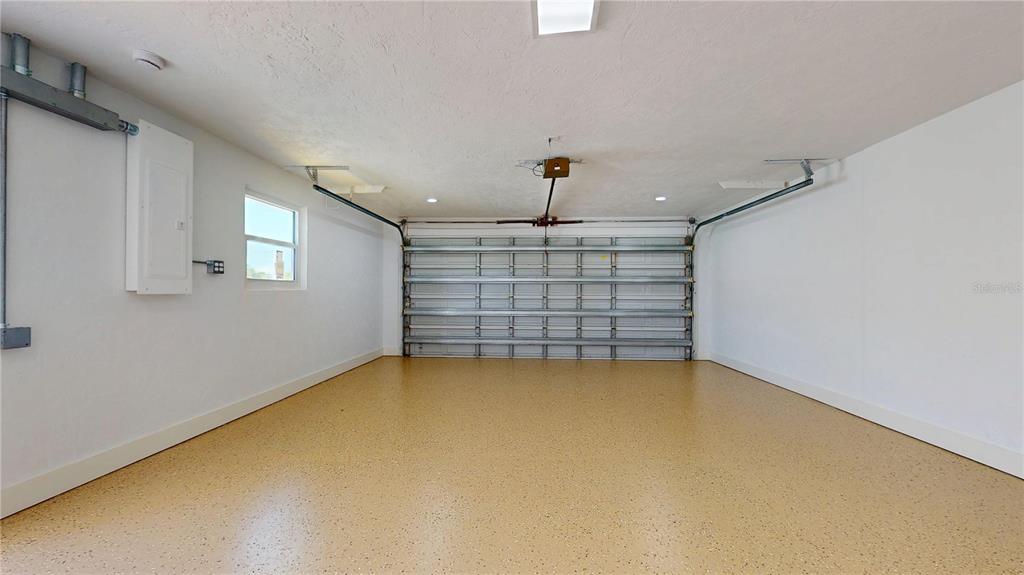 6380 3rd Palm Point St. Pete Beach, FL 33706 - Photo 44 of 48 a view of a livingroom with a ceiling fan and window