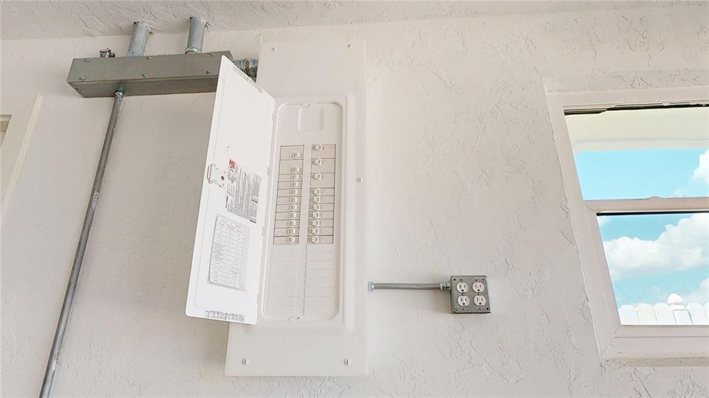 6380 3rd Palm Point St. Pete Beach, FL 33706 - Photo 45 of 48 an entryway with stairs and a window