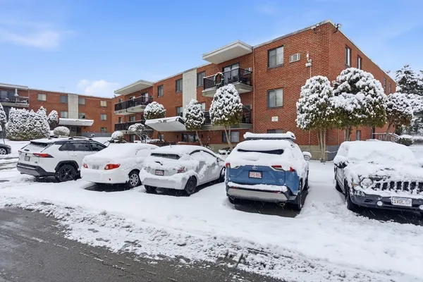 a cars parked in front of a house