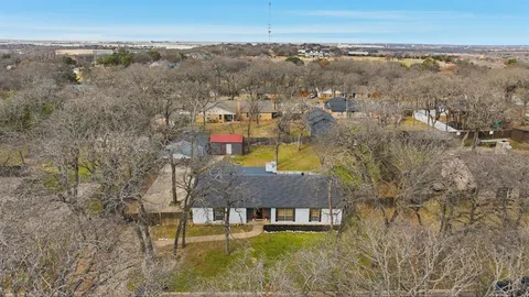 a aerial view of a house with a outdoor space