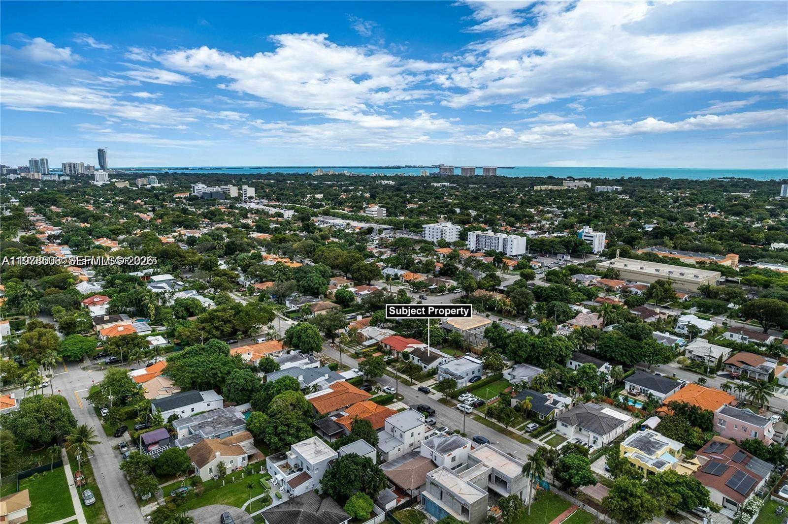 2520 Southwest 20th Street, Unit 1 Miami, FL 33145 - Photo 2 of 16 an aerial view of residential houses with city view