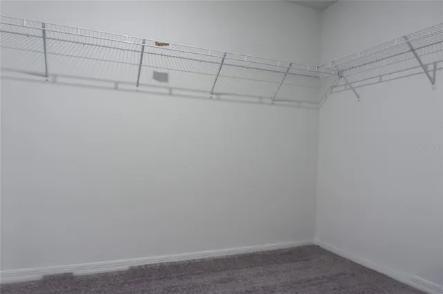 a view of a room with racks on the wall