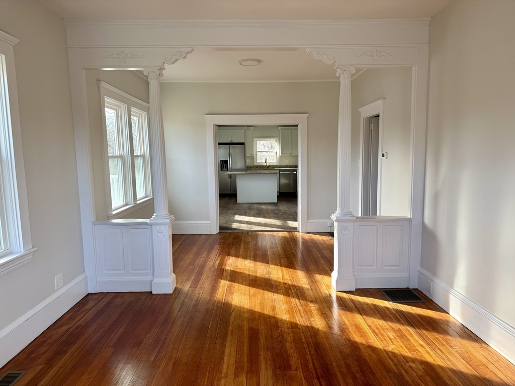513 Slocum Road Dartmouth, MA 02747 - Photo 13 of 34 a living room with a bed furniture and a window