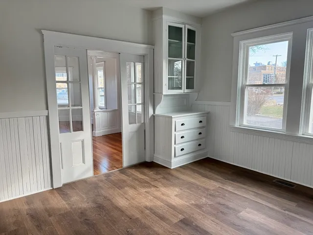 a view of livingroom with furniture and windows