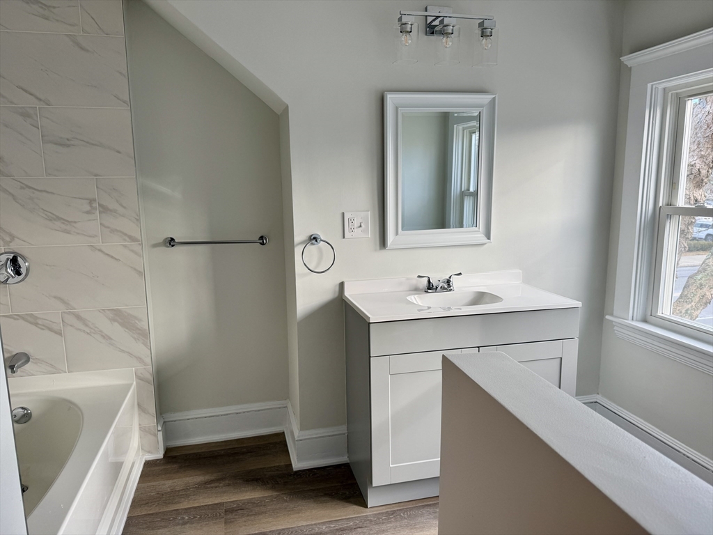 513 Slocum Road Dartmouth, MA 02747 - Photo 29 of 34 a bathroom with a sink a toilet and shower