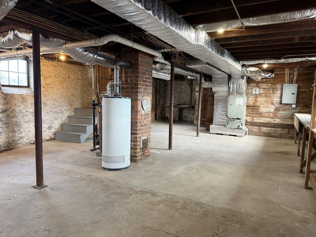 513 Slocum Road Dartmouth, MA 02747 - Photo 33 of 34 a view of a room with wooden floor