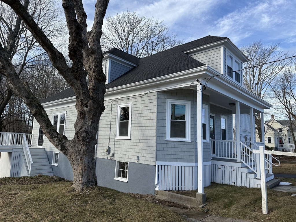 513 Slocum Road Dartmouth, MA 02747 - Photo 8 of 34 a view of a house with a yard