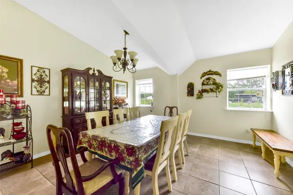 a kitchen with stainless steel appliances granite countertop a stove sink and cabinets