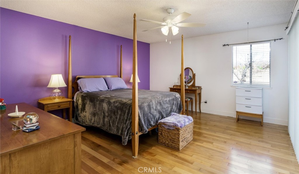 27062 Terrytown Road Menifee, CA 92586 - Photo 18 of 36 a bedroom with furniture and a window