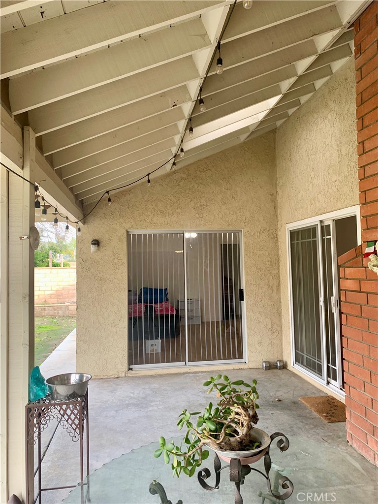 27062 Terrytown Road Menifee, CA 92586 - Photo 31 of 36 a view of a porch with furniture