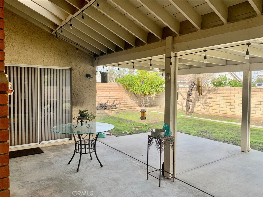 27062 Terrytown Road Menifee, CA 92586 - Photo 32 of 36 a view of an outdoor space with porch and furniture