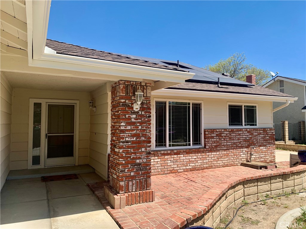 27062 Terrytown Road Menifee, CA 92586 - Photo 4 of 36 front view of a house with a patio