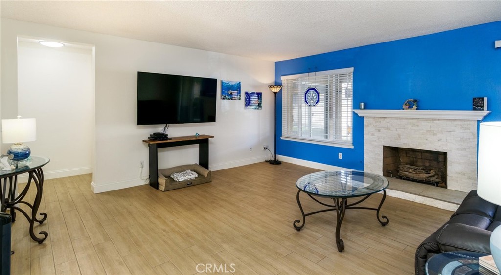 27062 Terrytown Road Menifee, CA 92586 - Photo 10 of 36 a living room with furniture and a flat screen tv