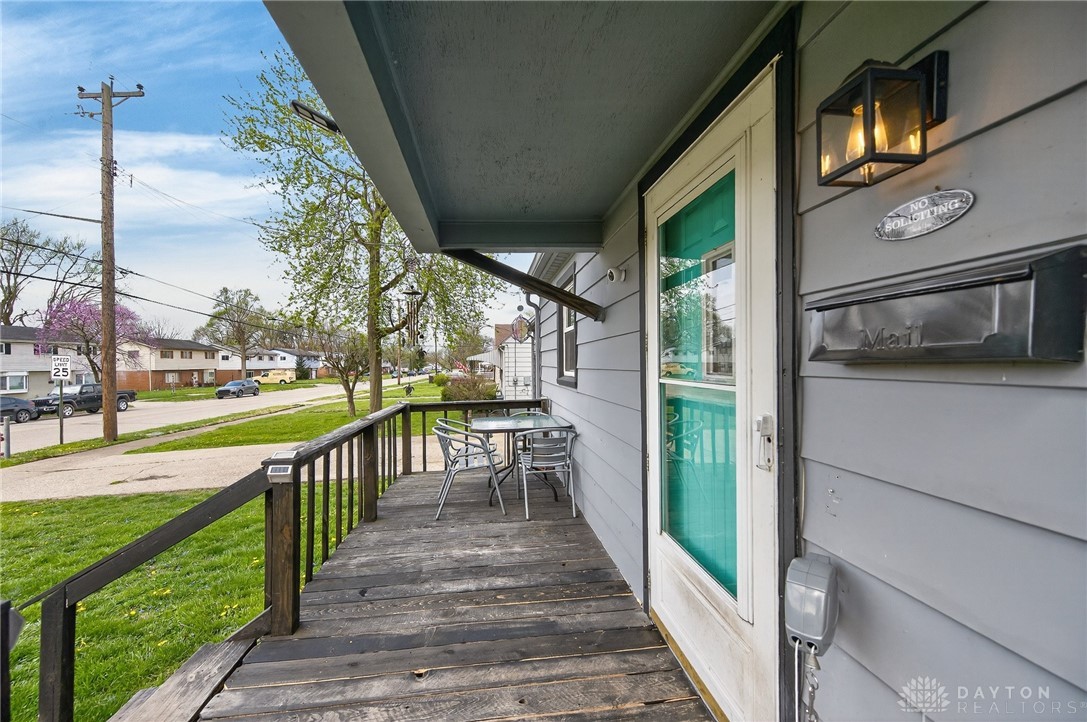 3301 Wildwood Road Middletown, OH 45042 - Photo 3 of 68 This inviting porch entry offers a charming welcome, providing a comfortable outdoor space.