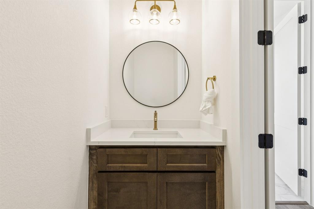 711 Hummingbird Lane Justin, TX 76247 - Photo 28 of 38 Guest Half Bath