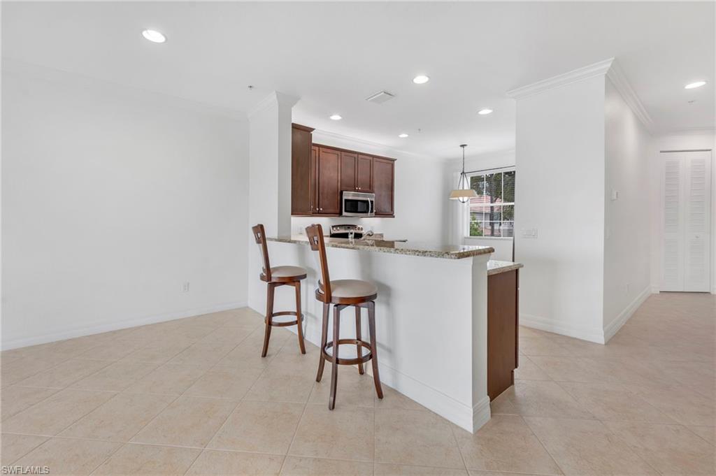 6505 Monterey Point, Unit 202 Naples, FL 34105 - Photo 7 of 30 The breakfast area.