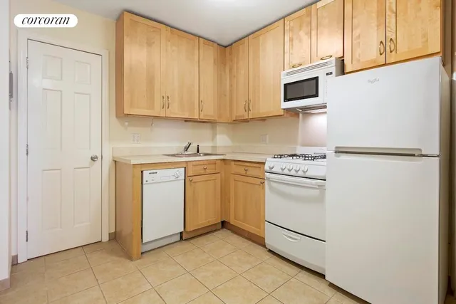 a view of livingroom with hardwood floor and a ceiling fan