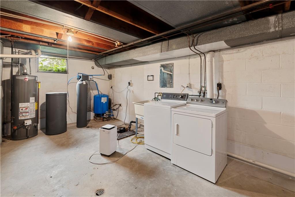 109 Beacon Road Renfrew, PA 16053 - Photo 25 of 33 a view of a storage & utility room with washer and dryer