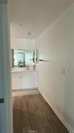 a view of a kitchen with a sink
