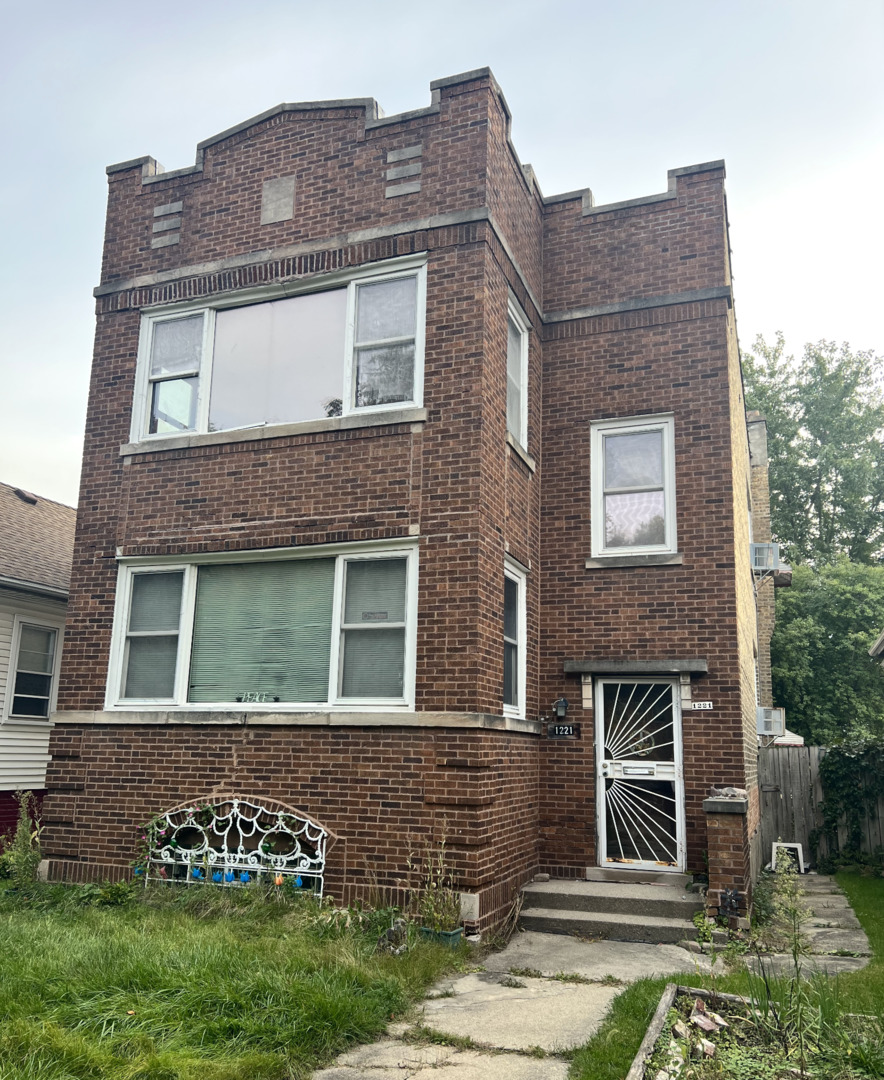 1221 Darrow Avenue Evanston, IL 60202 - Photo 1 of 1 a front view of a house with garden