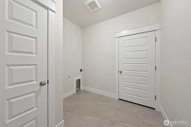 a view of a house with a backyard and a yard