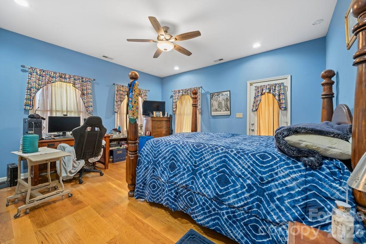 492 State Rd S-11-586 Gaffney, SC 29340 - Photo 17 of 45 a bedroom with a bed and wooden floor