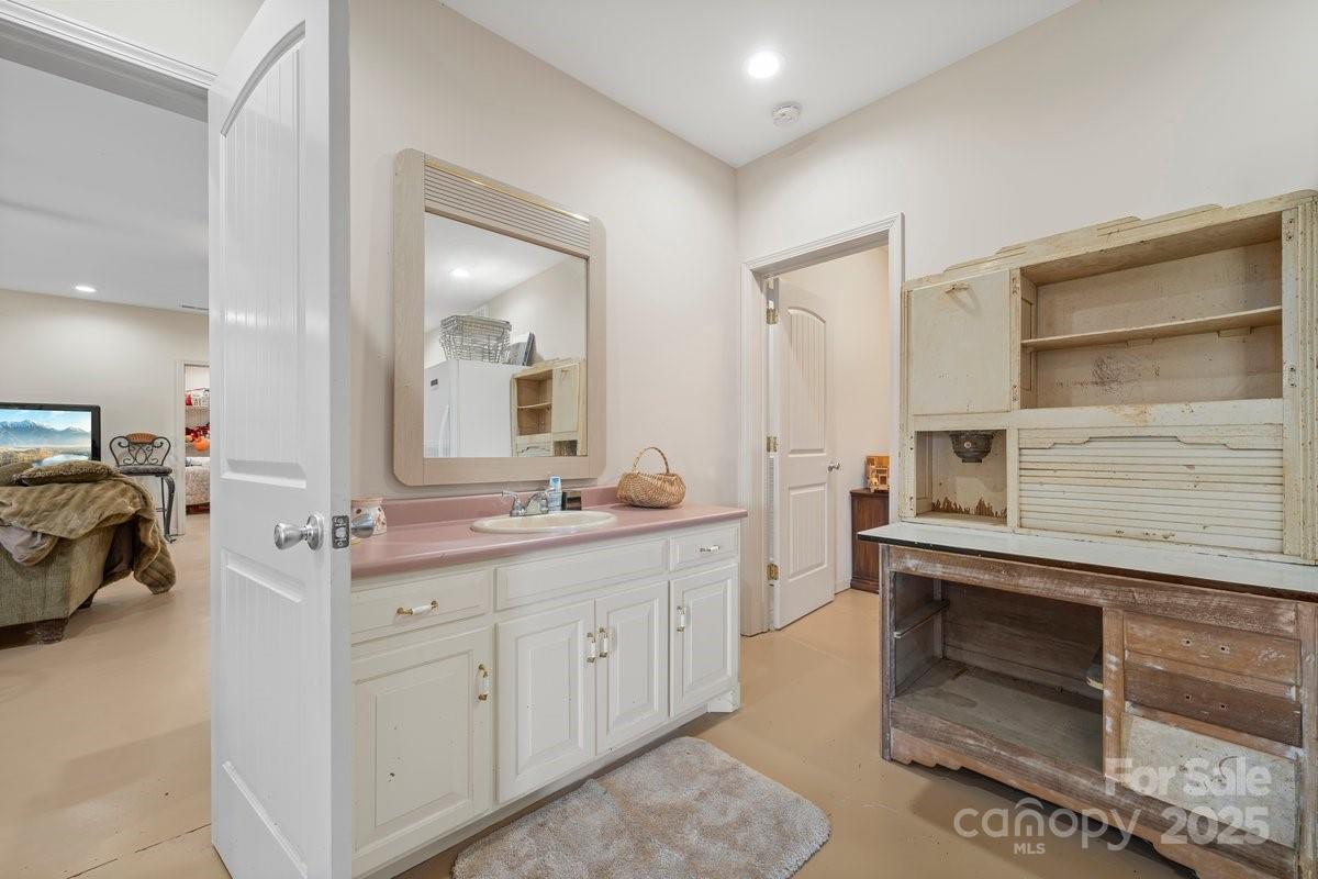 492 State Rd S-11-586 Gaffney, SC 29340 - Photo 34 of 45 a spacious bathroom with a double vanity sink and a mirror