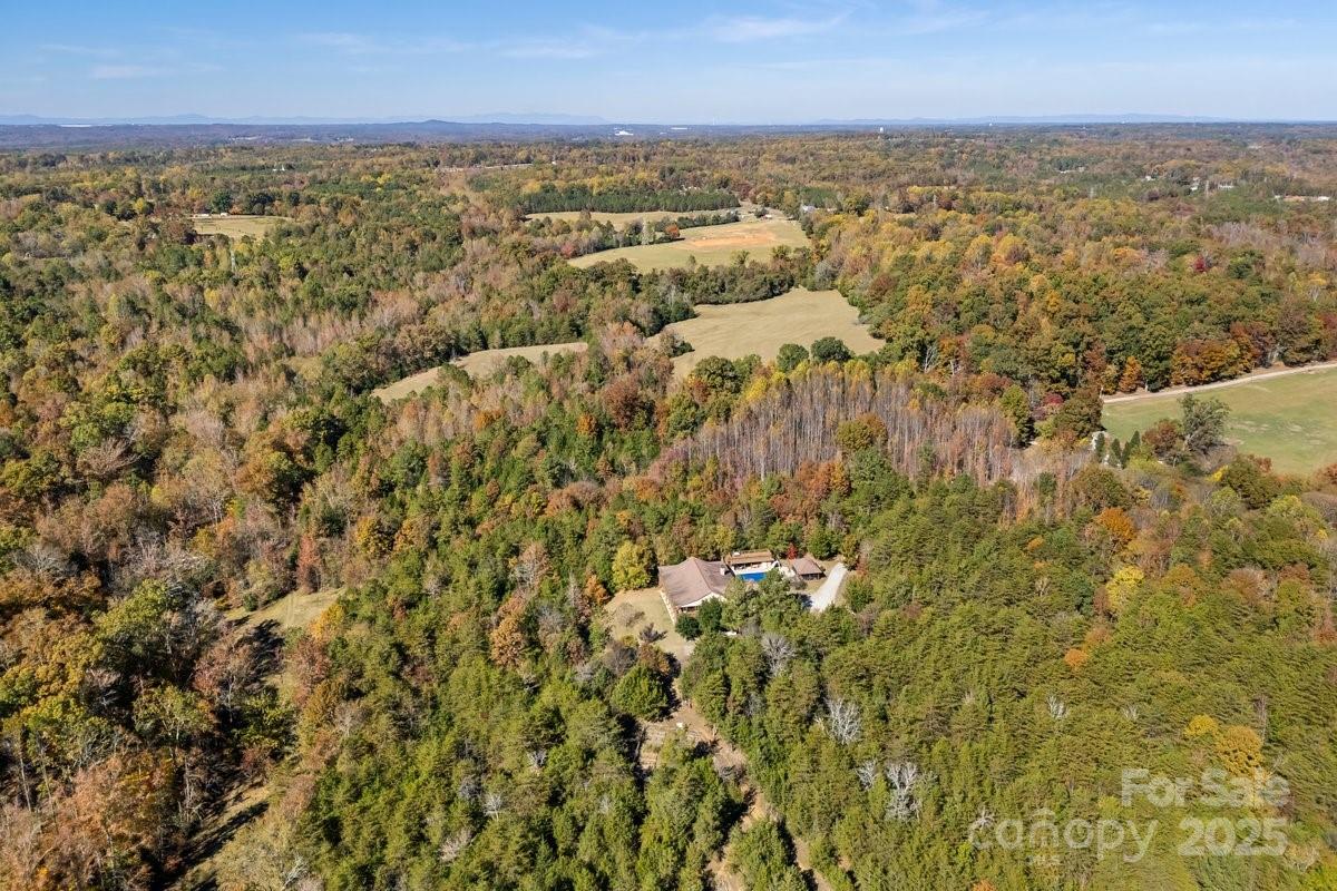 492 State Rd S-11-586 Gaffney, SC 29340 - Photo 43 of 45 an aerial view of residential houses with outdoor space and trees