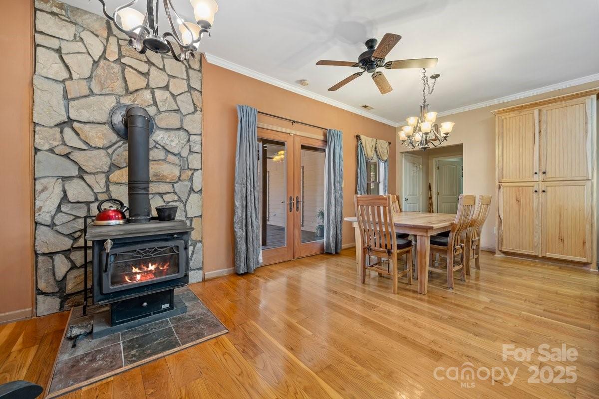 492 State Rd S-11-586 Gaffney, SC 29340 - Photo 10 of 45 a view of a dining room with furniture and chandelier