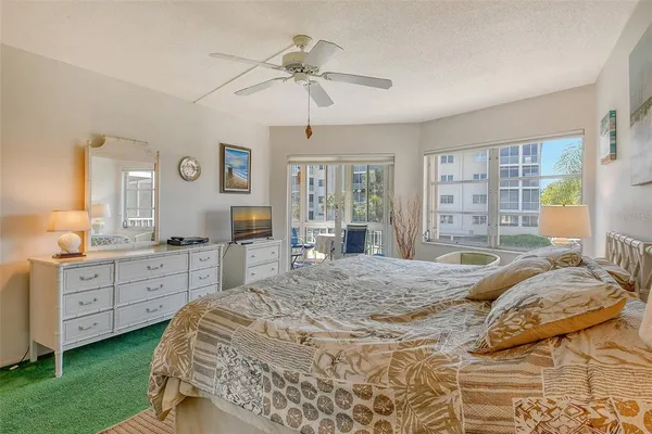 a view of a lake with a building in the background