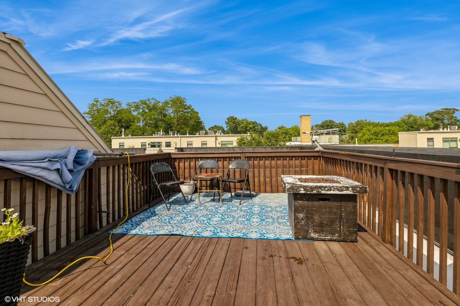 162 Dawson Drive Elgin, IL 60120 - Photo 14 of 15 a view of roof deck with wooden floor and fence and city view