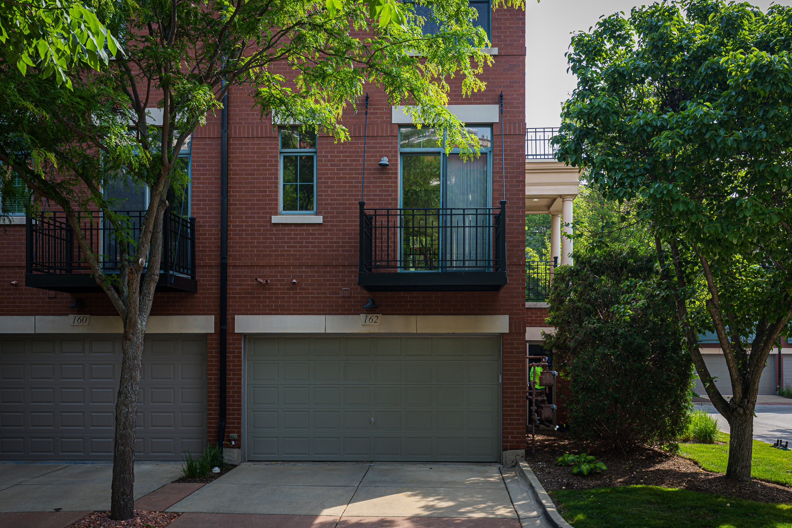 162 Dawson Drive Elgin, IL 60120 - Photo 15 of 15 front view of a house with a tree