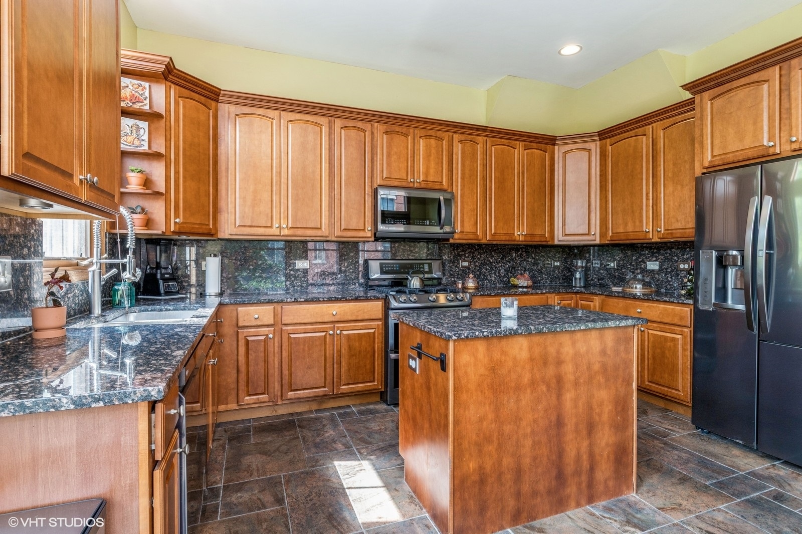 162 Dawson Drive Elgin, IL 60120 - Photo 5 of 15 a kitchen with stainless steel appliances granite countertop a refrigerator a stove top oven a sink and dishwasher